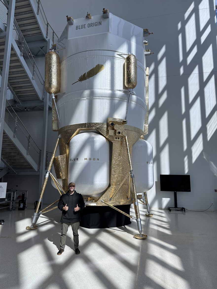 Frank Mellana in front of Blue Origin's Blue Moon lunar lander