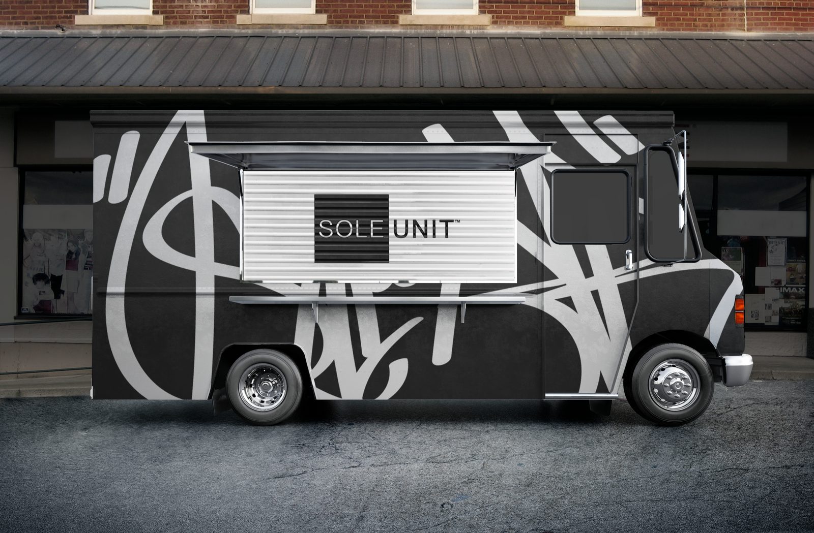 Sole Unit pop-up truck wrapped in black and white calligraphy