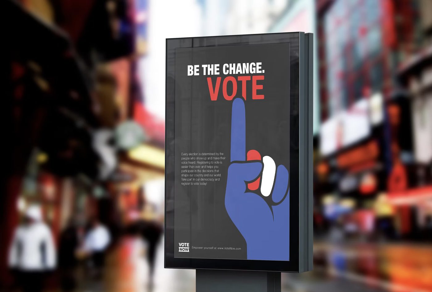 Be the Change VOTE poster on a city street display